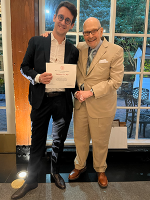 Dr. Tosi Wins 2024 Apuzzo Award - shown with Dr. Michael Apuzzo